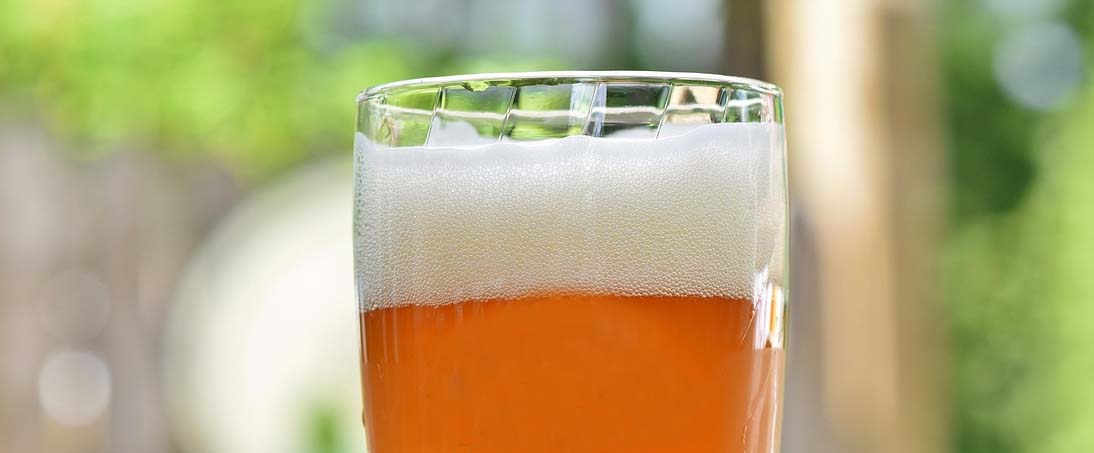 Quorum sensing-based alcohol production by yeast